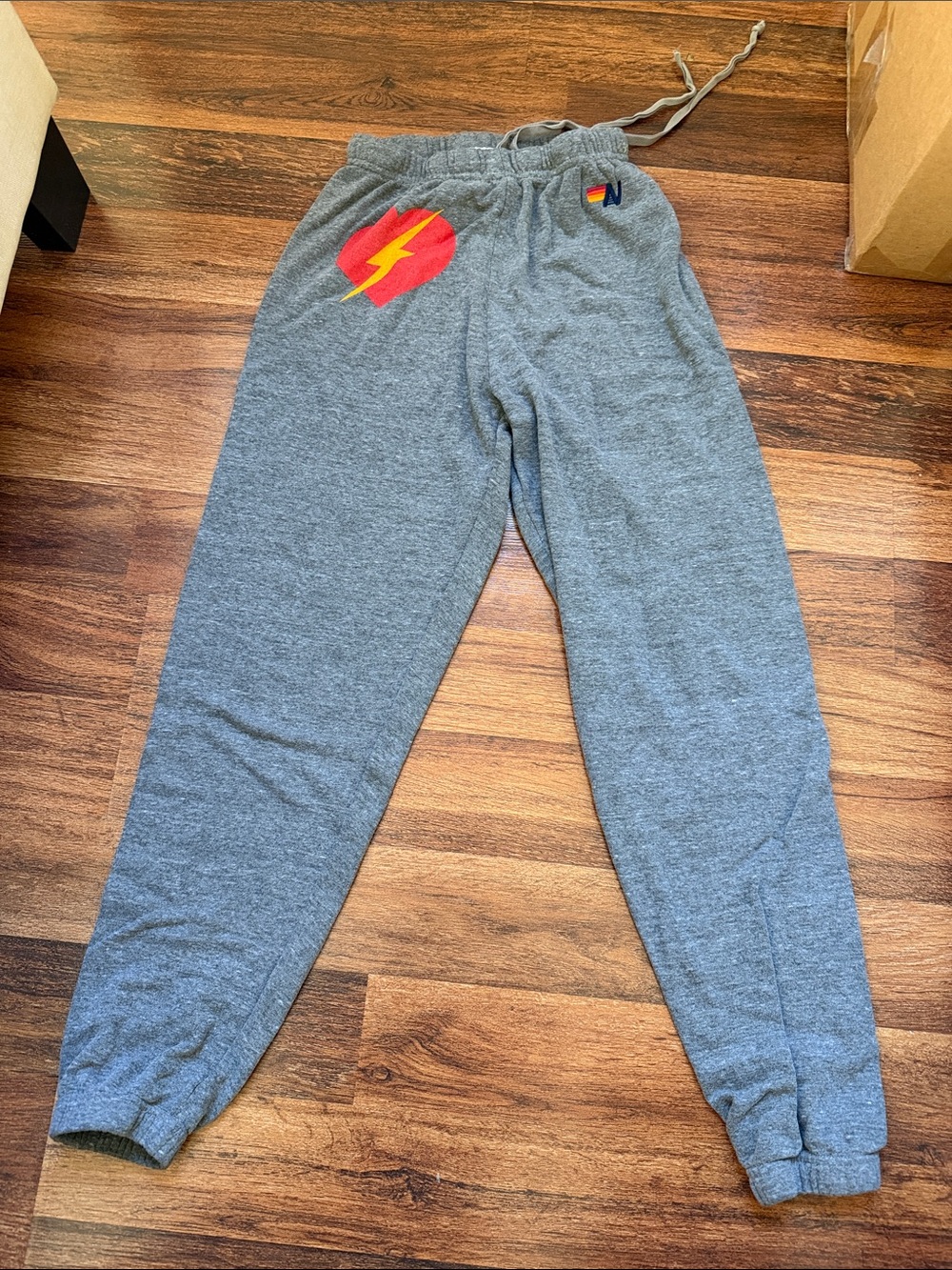 Aviator Nation Gray Joggers with Red & Yellow Lightning Patch